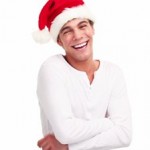 stock-footage-joyful-young-man-wearing-white-shirt-and-santa-hat-is-celebrating-christmas-smiling-and-laughing